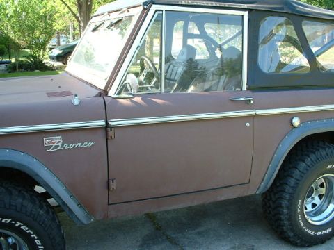 1995 Ford Bronco - This 1974 Ford Bronco shows its distinctive side profile, including the iconic 'Bronco' badging on the fender.