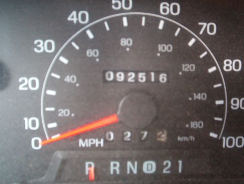 2000 Ford Excursion - The vehicle's speedometer reads 0 MPH, indicating it is stationary, and displays 02516 miles on the odometer.