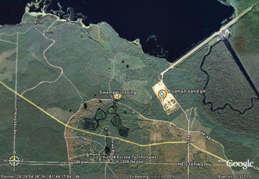 Aerial view of a rural area with roads, water, and a sand pit labeled 'Rodman sand pit'