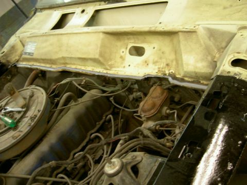 1967 Ford Ranchero - Engine bay of a 1967 Ford Ranchero during restoration, with visible brake components and wiring.
