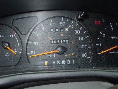 1999 Ford Taurus - The odometer shows 107,175 miles on this vehicle's dashboard.