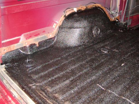 1991 Ford Bronco - Vehicle's rear cargo area after bedliner application.