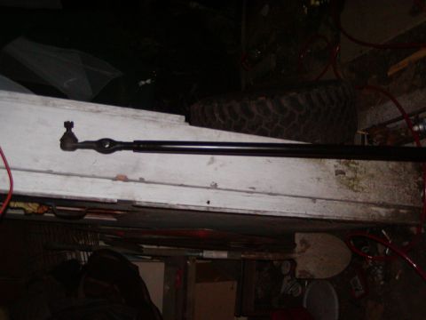 1991 Ford Bronco - Steering linkage rod with ball joint end, likely for an off-road vehicle.