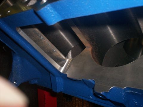 1990 Ford Mustang - Engine block cylinder bore detail, showing machined surfaces and blue painted exterior.