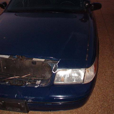 1999 Ford Crown Victoria - The header panel really shattered.