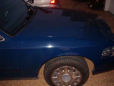 1999 Ford Crown Victoria - I haven't opened the hood yet, and I probably won't until I drop it off at the body shop.