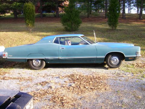 1971 Mercury Marquis - Side profile of a 1971 Mercury Marquis coupe in teal green.