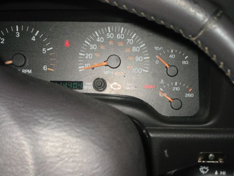 2000 Jeep Cherokee - Interior view of a 2000 Jeep Cherokee's dashboard gauges, displaying mileage and operational readings.