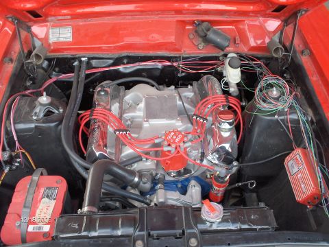 1966 Ford Fairlane - In this picture, the ignition system and charging system were done. The wires did not remain exposed. Bob shielded them with that black pla…