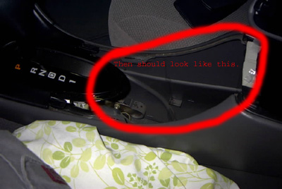 1999 Ford Taurus - A red circle highlights a section of the car's interior, with text indicating how it should appear.