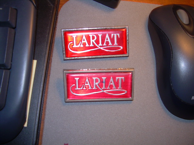 two red Lariat emblems