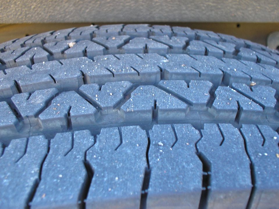 Close-up of an all-season tire tread pattern