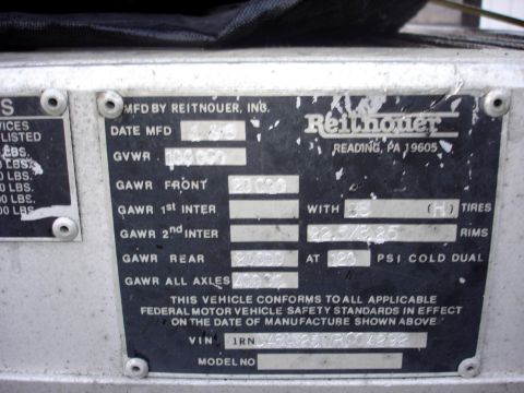 2006 Ford F-350 - Close-up of a Reitnauer Inc. VIN plate showing weight ratings and VIN.