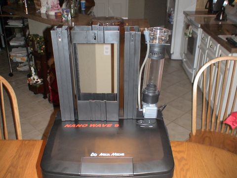 1993 Ford C-350 (Centurion Conversions) - Aqua Medic NanoWave 9 protein skimmer is shown on a wooden table in a kitchen.