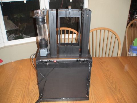 1993 Ford C-350 (Centurion Conversions) - Aquarium equipment, including a protein skimmer and filter, is set up on a wooden table.