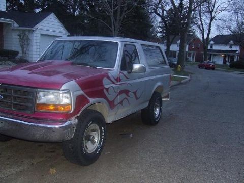 1992 Ford Bronco - This 1992 Ford Bronco features custom flame graphics on its hood and sides.