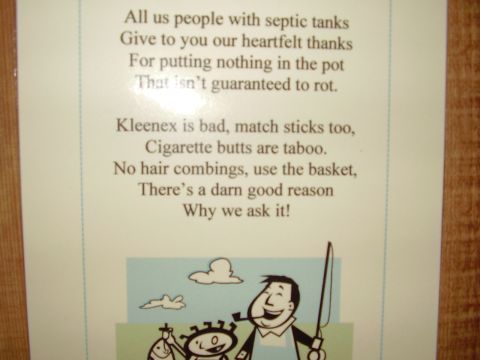 1996 Ford F-150 - A document displays a poem about septic tank etiquette, accompanied by a cartoon illustration of two people fishing.