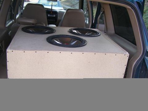 1998 Mercury Mountaineer - Custom subwoofer box fills the cargo area of a 1998 Mercury Mountaineer.