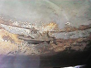1986 Ford Bronco - up inside rear passenger wheelwell "before"