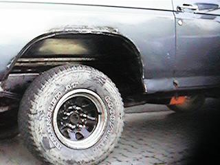 1986 Ford Bronco - can't afford the new rims yet, so I made due with the POR-15 and the stockers...they actually look pretty good with new lug nuts!