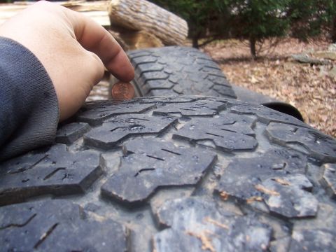 1994 Jeep YJ - Measuring tire tread depth with a penny.