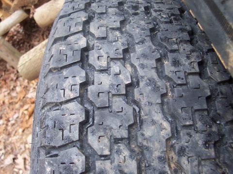 1994 Jeep YJ - Tire tread detail, likely from an off-road vehicle.