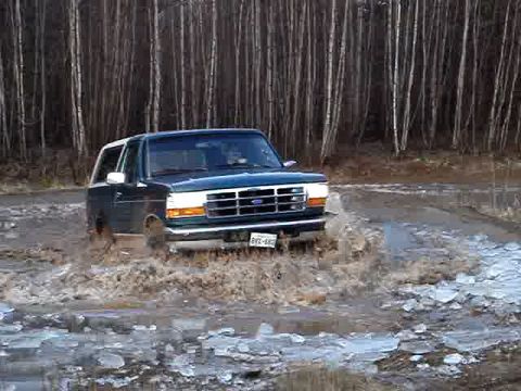 1996 Ford Bronco - This 1996 Ford Bronco navigates a muddy, icy terrain.