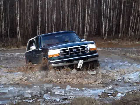 1996 Ford Bronco - This 1996 Ford Bronco navigates a muddy, watery terrain.