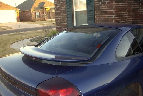 1994 Dodge Stealth - Rear view of a blue 1994 Dodge Stealth coupe a prominent rear spoiler.