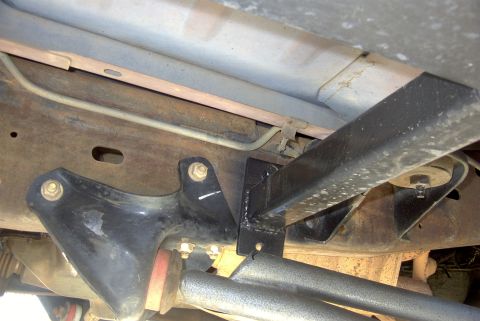 1994 Ford Bronco - This photo shows the undercarriage of a vehicle, focusing on the frame and attached sliders.
