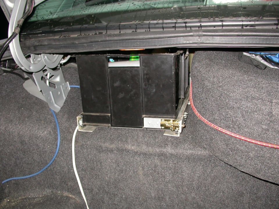Trunk mounted audio equipment with wiring