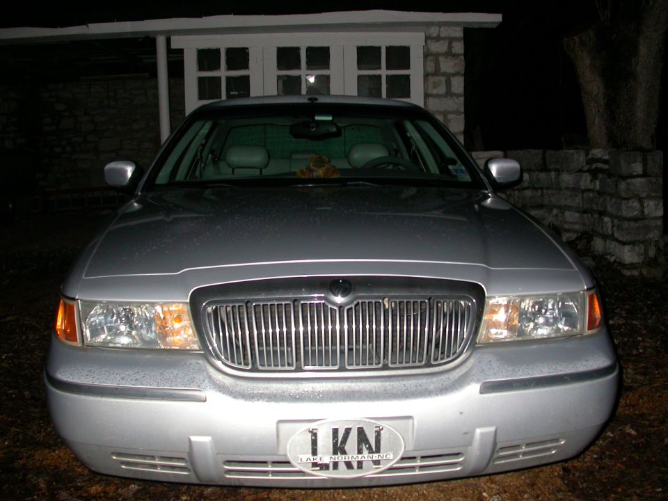 Silver 1998 Mercury Grand Marquis front view with chrome grille