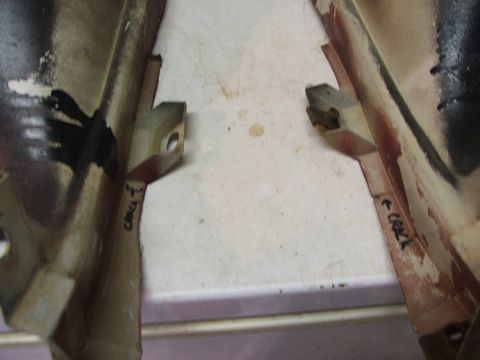 1965 Ford Mustang - Two car parts are shown with handwritten labels indicating cracks.