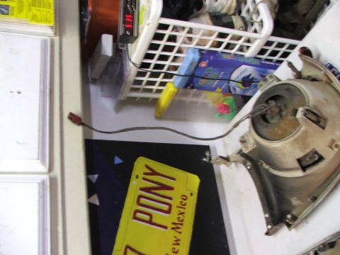 1965 Ford Mustang - Headlight assembly and 'PONY' license plate are visible in this image.