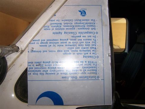 1995 Ford Bronco - Instructions for cleaning and installation are attached to the interior of a vehicle.