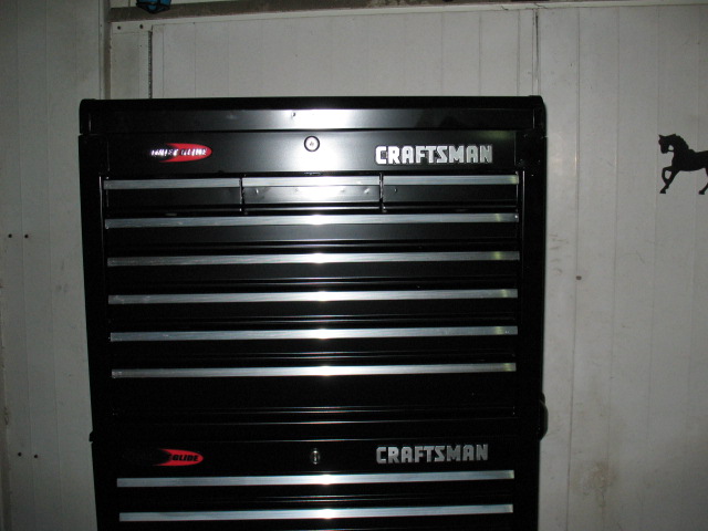 Black Craftsman tool chest with multiple drawers