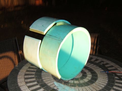 1980 Jeep CJ5 - A section of large diameter pipe is shown resting on a patterned surface.