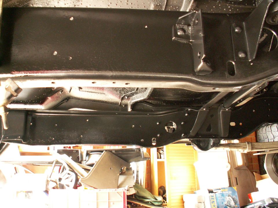all chassis cleaned down with wire wheel on grinder and sprayed with chassis black...23 yr old truck looking new again