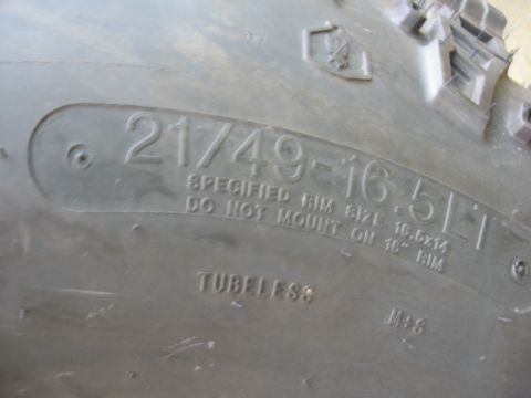 1974 Ford F-100 - Close-up of a tire's sidewall showing size and mounting information.