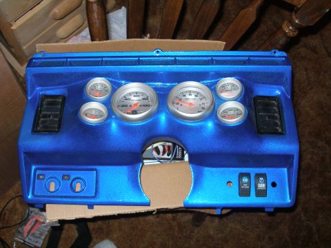 1984 Ford Bronco - A custom dashboard panel with gauges and vents is shown.
