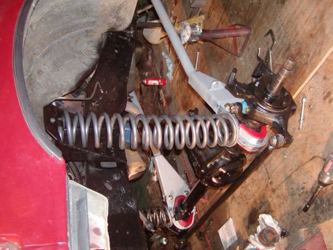 1991 Ford Bronco - This photo shows a vehicle's suspension system, including a coil spring and steering components.