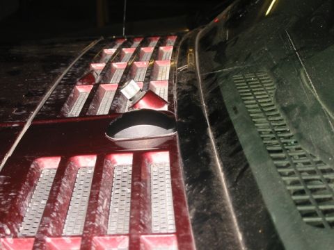 2000 Jeep Cherokee - Antenna in place against the windshield seal; the backing from the adhesive has been removed and it's now permanently mounted. Note that th…