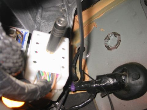 2000 Jeep Cherokee - Detail showing the grommet around the hood release cable (look to the left of the plug in the bulkhead) that was removed to drop the antenn…