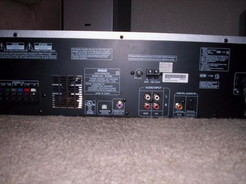 1989 Ford Bronco - The back of an RCA audio receiver shows multiple input and output ports for audio connections.