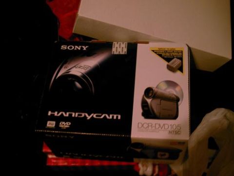 1986 Ford Bronco - The box for a Sony Handycam DCR-DVD105 camcorder is visible, showing the device and a DVD.