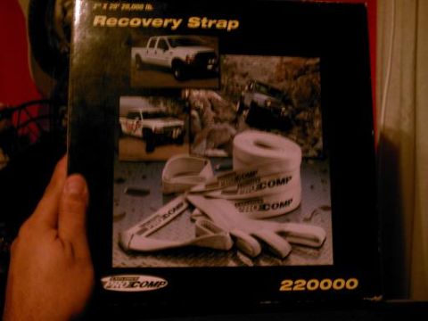 1986 Ford Bronco - Box for a Pro Comp recovery strap, images of trucks and the product itself.