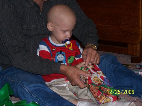 1979 Ford F-150 - A child opens a Christmas present on December 25, 2006, with help from an adult.