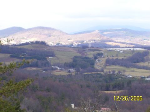1993 Ford Bronco - A scenic view of rolling hills, a distant town, and mountains, captured on December 26, 2006.