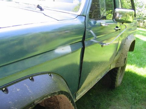 1986 Ford Bronco - Little bit more battle damage...nothing mechanix gloves and some tugging didn't fix