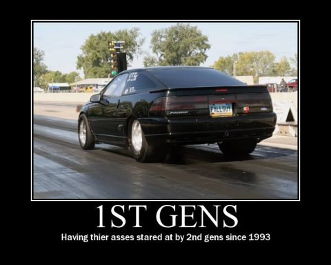1989 Ford Probe - A black 1989 Ford Probe is shown on a drag strip, viewed from the rear.